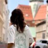 MANIA × SHERPA tee DAUGHTERS OF TIDE ecru